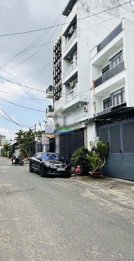 Sát mặt tiền - ngay emart phan huy ích - 4 tầng kiên cố - dt 4.5mx14m - ô tô ngủ trong nhà - 2