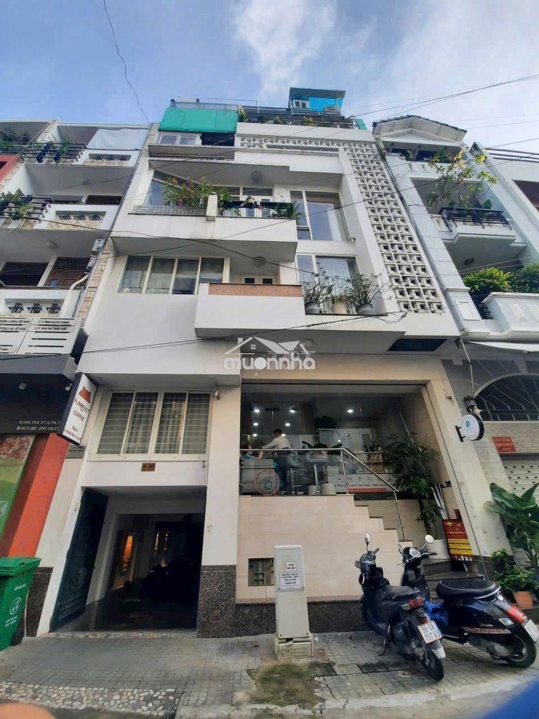 Tòa nhà đường phổ quang. dt: 7x20m. hầm - trệt - 4 tầng