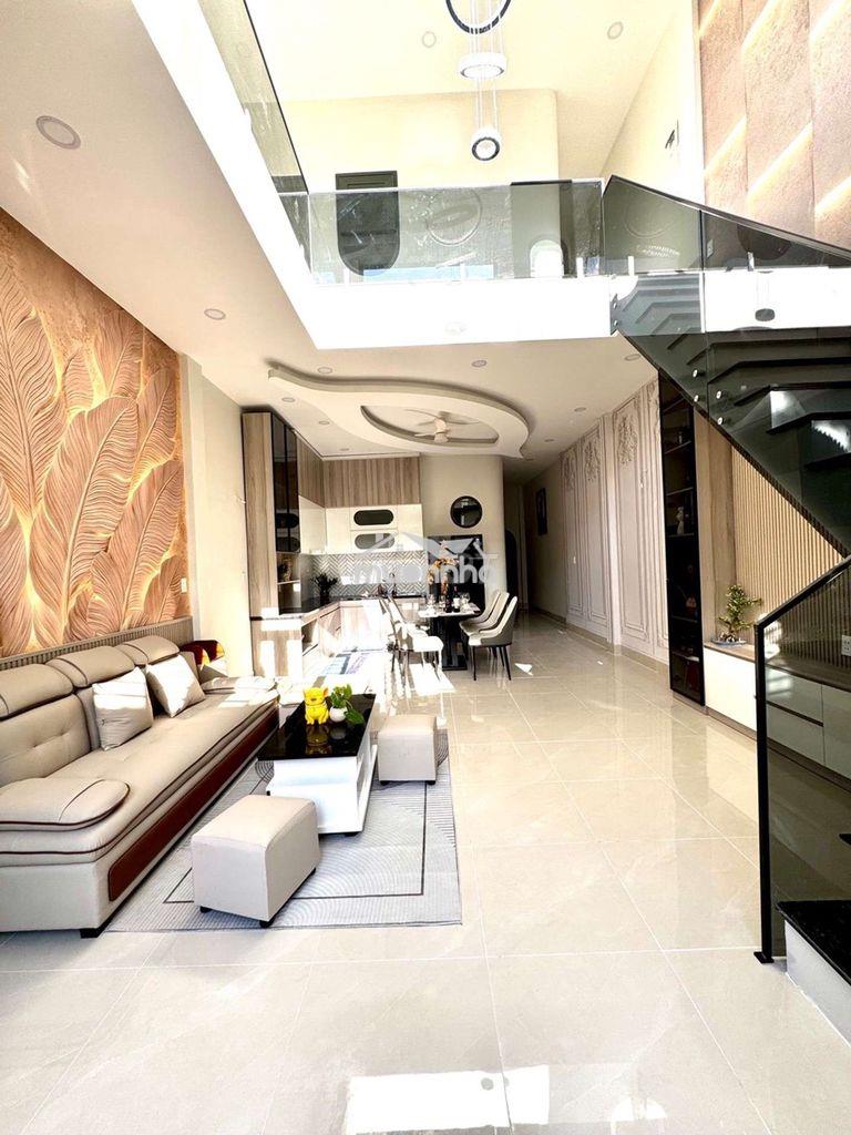 Mới xây 84trm ngang 5m hẻm xe hơi đậu cửa full nội thất chợ an nhơn 
