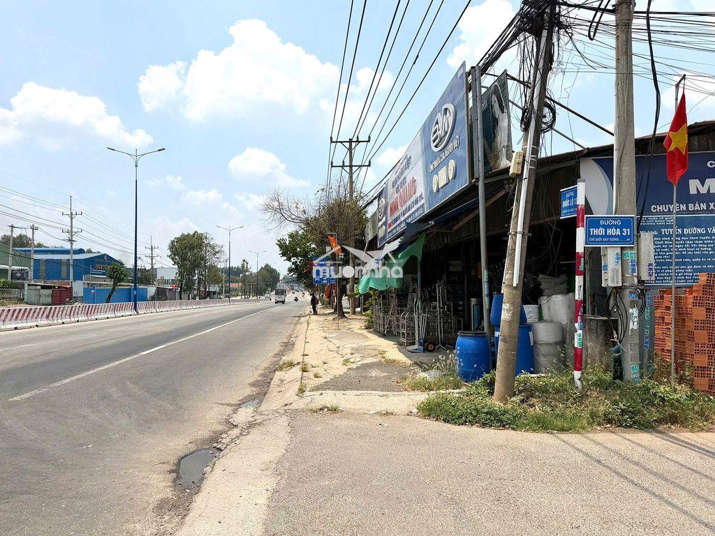 Cho thuê mặt bằng lô góc, mặt tiền quốc lộ 13, gần cổng phụ mỹ phước 3 - 2