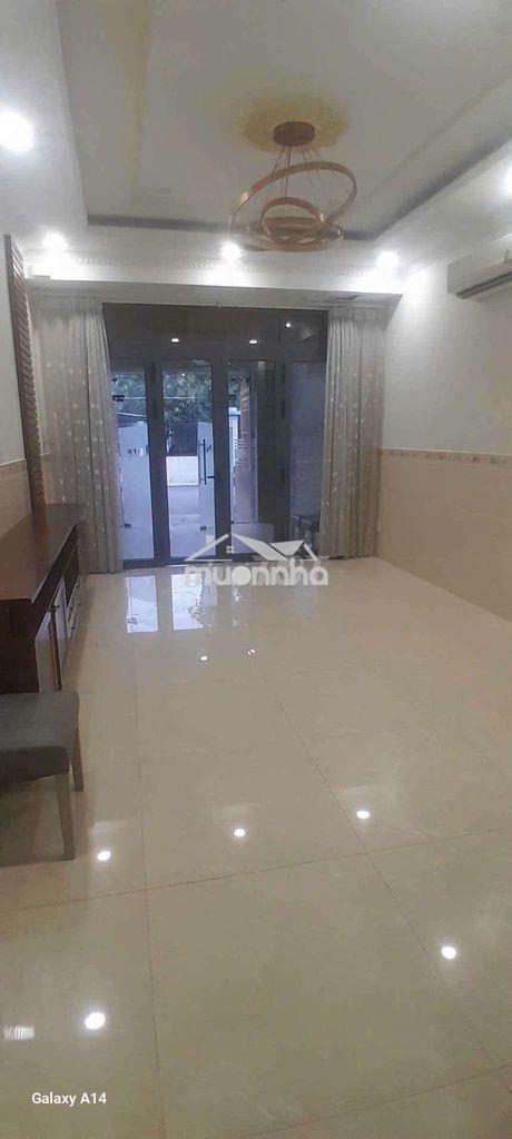 Nhà 2 lầu sân xe hơi gần đường trần hưng đạo 