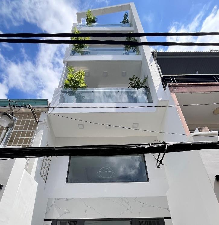 Bán nhà mới 5 tầng đã có nội thất kế chợ phạm văn hai , giá 7 tỷ tl