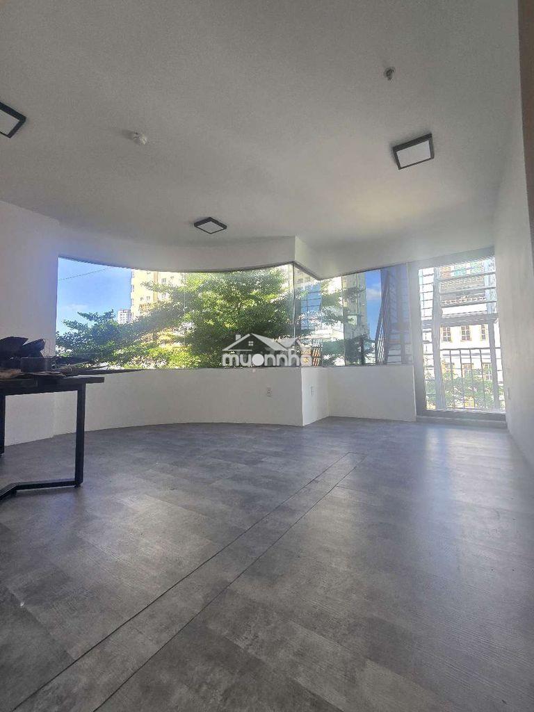 Cho thuê sàn lầu 2 tòa nhà 710 âu cơ,tân bình. dt 95m2, 3 phòng, 2wc - 3
