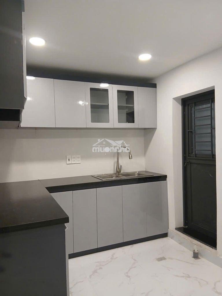 Nhà mới hẻm 4m đường cmt8, quận 10. dt 3,8x12m. 2 lầu - hđt cao