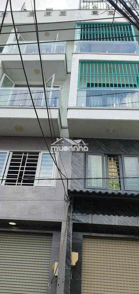 Nhà 1 trệt 3 lầu sân thượng 4pn hẻm xe xe bùi văn ba quận 7