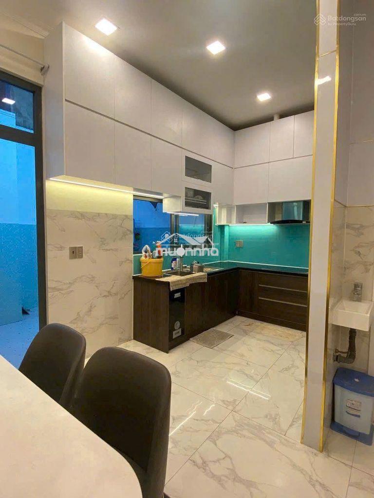 Nhà biệt thự mới xây rất đẹp,5m x 20m, 1 lầu,4pn,5wc,hẻm 3.5m hậu giag
