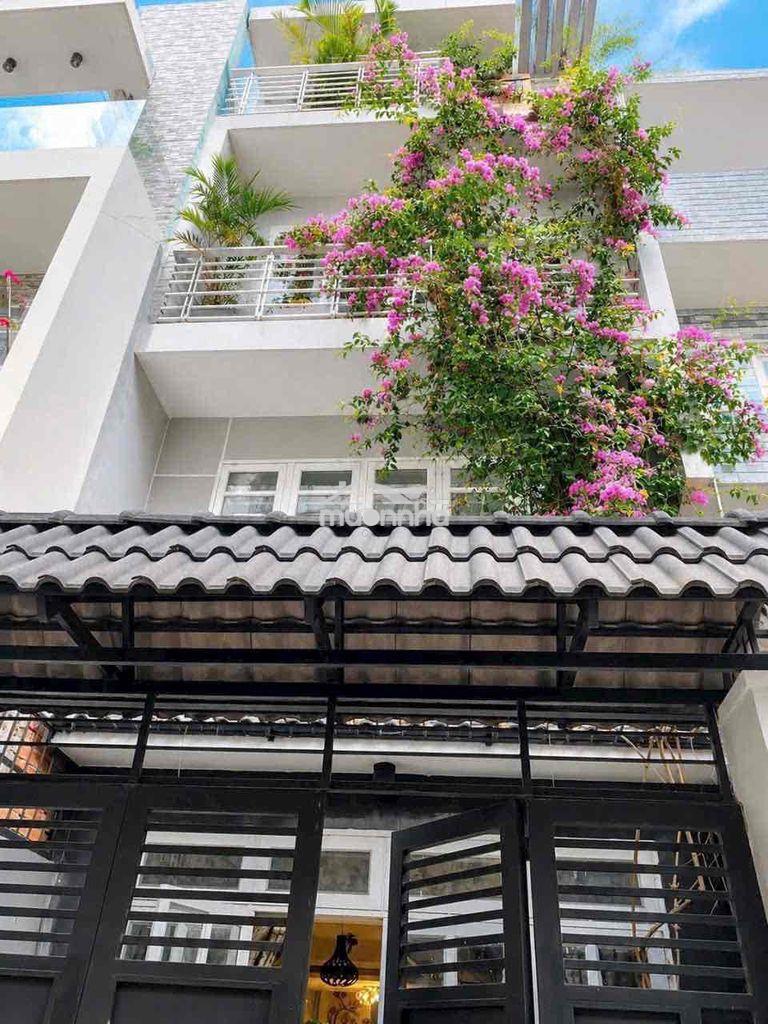 Cho thuê nhà 1/ hxh(4,5x15m )2lầu st 3pn.4wc 618 quang trung