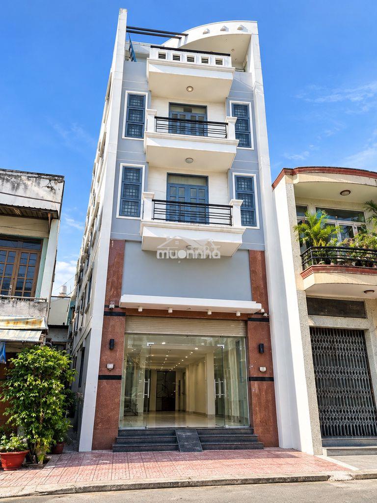 Tòa nhà 4 tầng  mt đường bình thới
